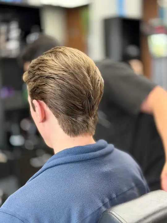 Men's haircut and styling at Bliss & Blade