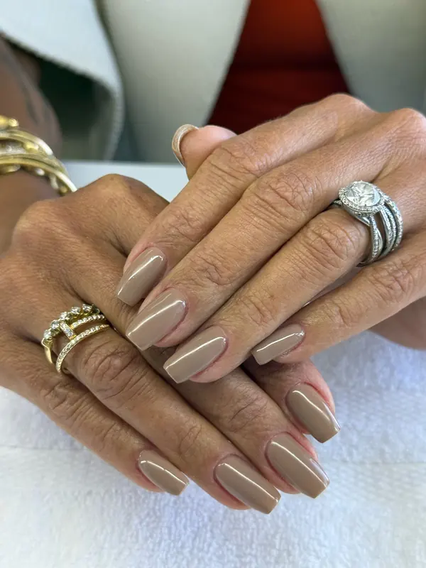 Natural manicure with a soft neutral polish