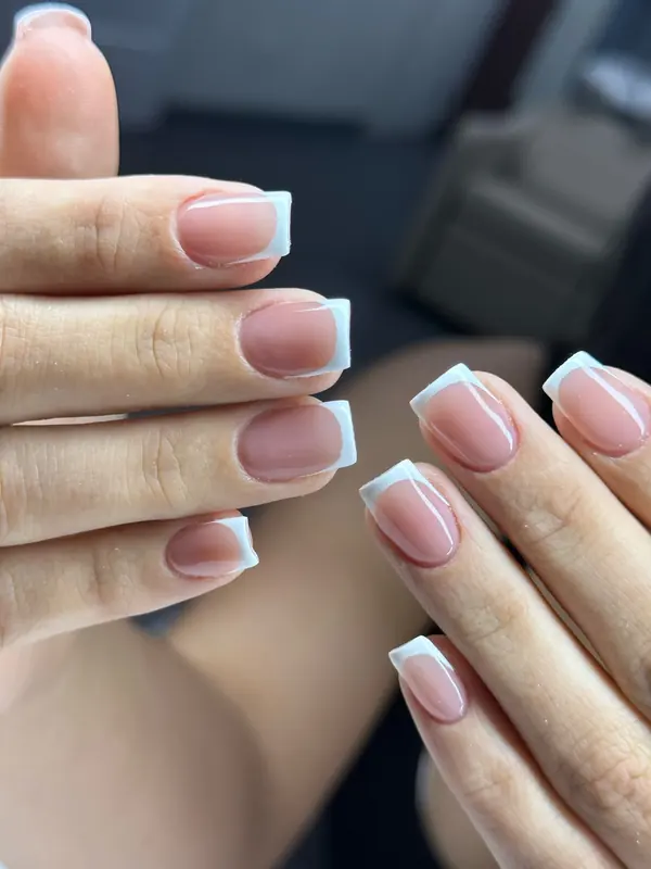 Soft pink manicure at Bliss & Blade