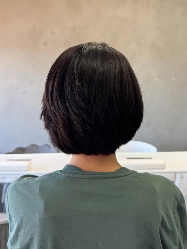 Short bob haircut styled at Bliss & Blade