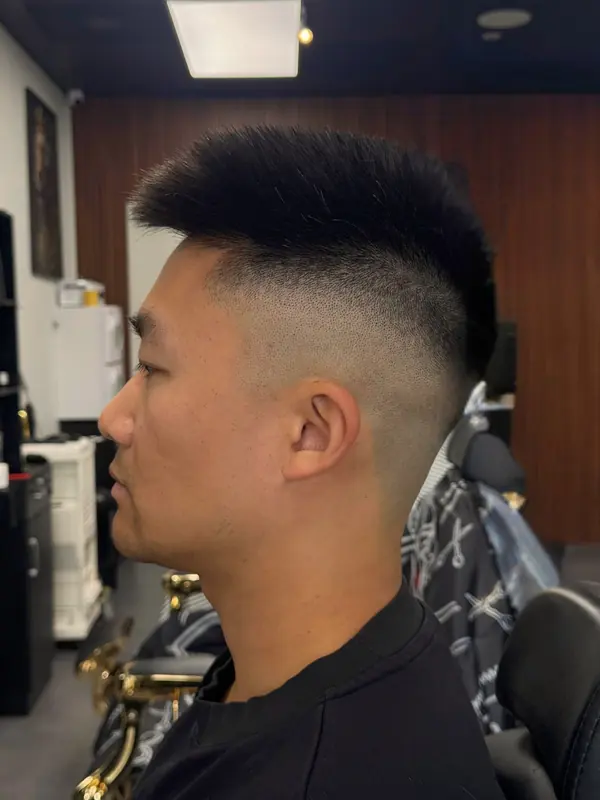 Clean fade haircut finished at Bliss & Blade