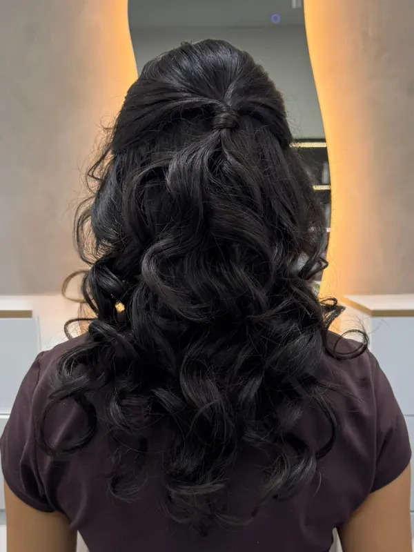 Dark hair styled in an elegant updo